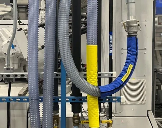 Colour-coded hoses in a plant