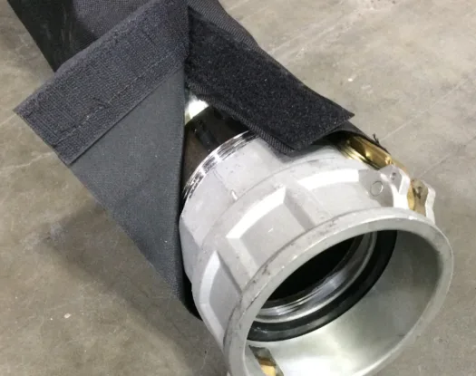 Black sleeve over a large coupling
