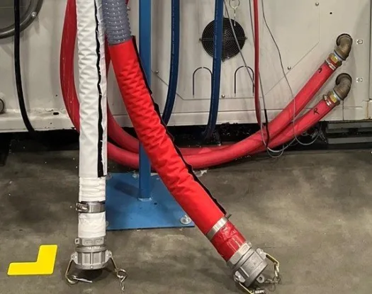 Colour-coded sleeve on plant hoses