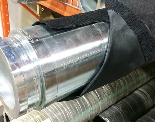 Black sleeve around a large pipe