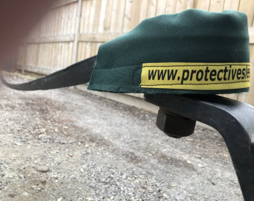 Strap saver on a tow strap