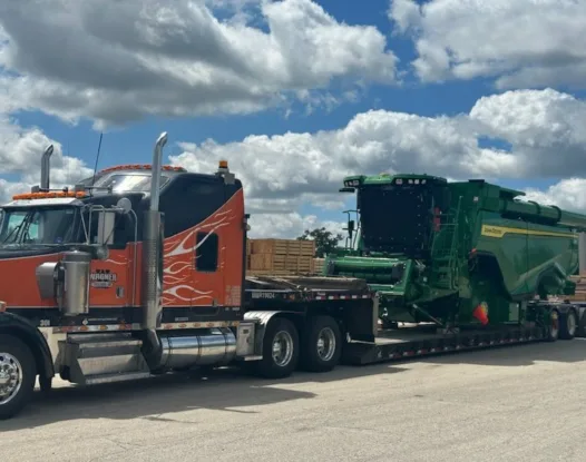 Covered combine on a truck