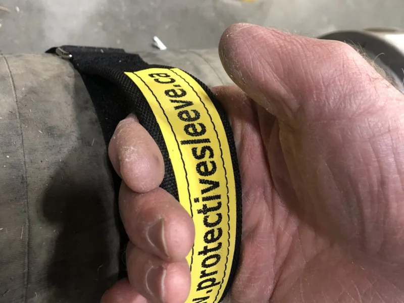 Lifting a hose by its Handy Handle