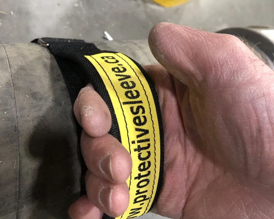 Lifting a hose by its Handy Handle