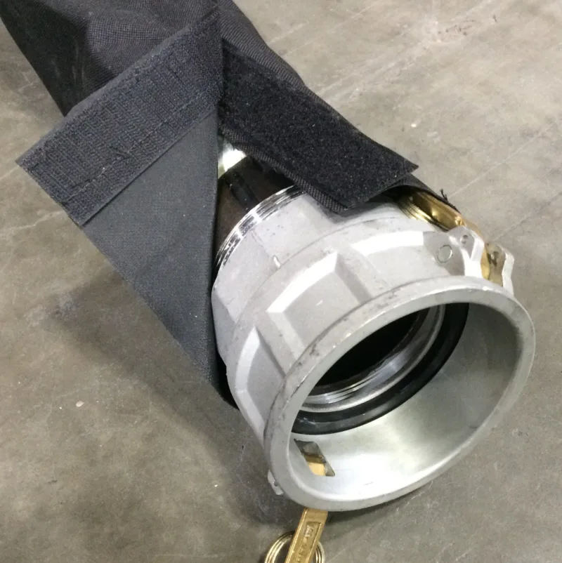 Black sleeve over a large coupling