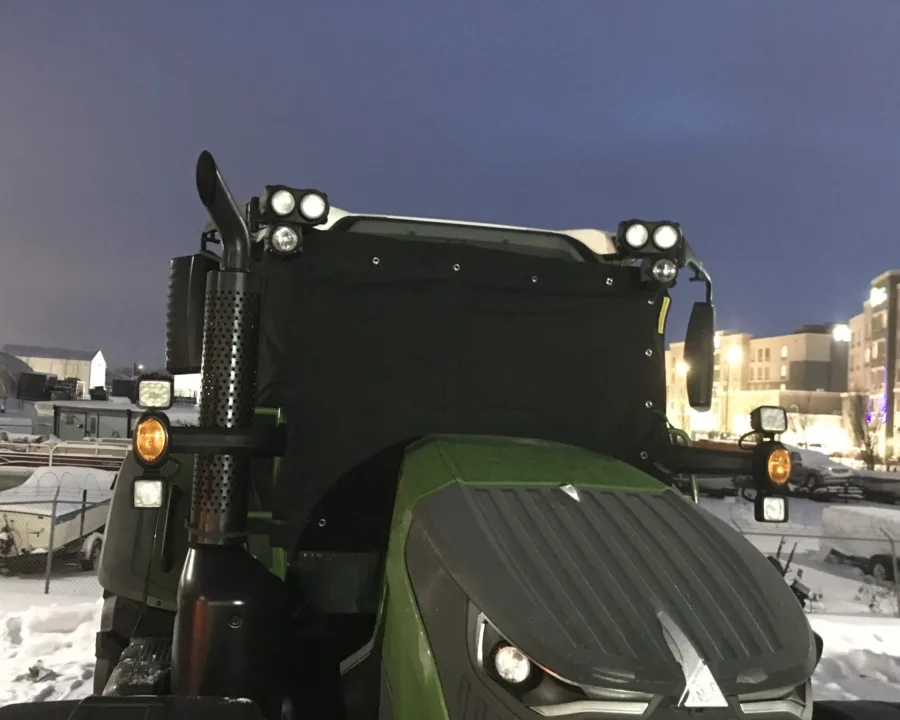 Windshield cover on a tractor cab